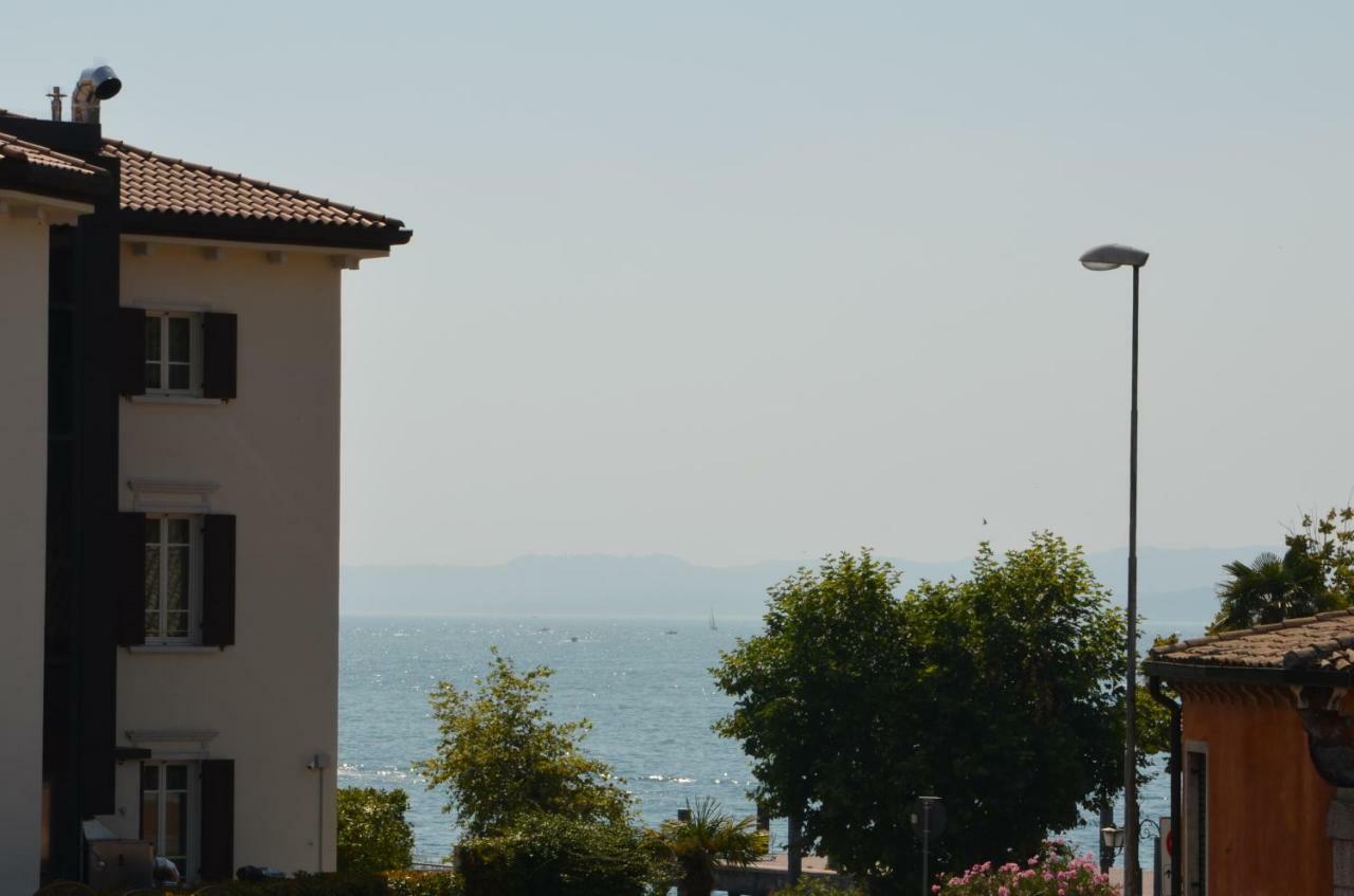 شقة Trilocale Palazzo Garda غارْدا المظهر الخارجي الصورة