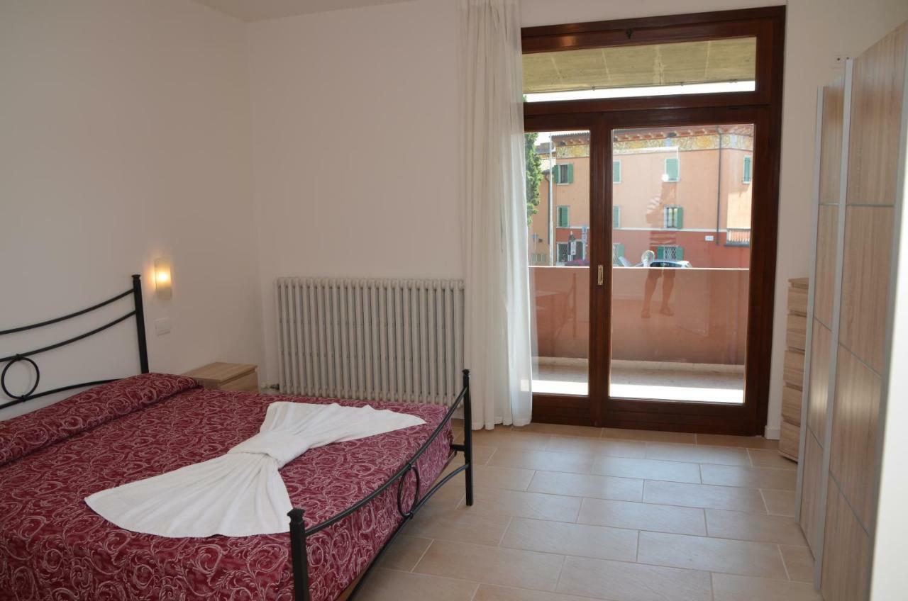 شقة Trilocale Palazzo Garda غارْدا المظهر الخارجي الصورة